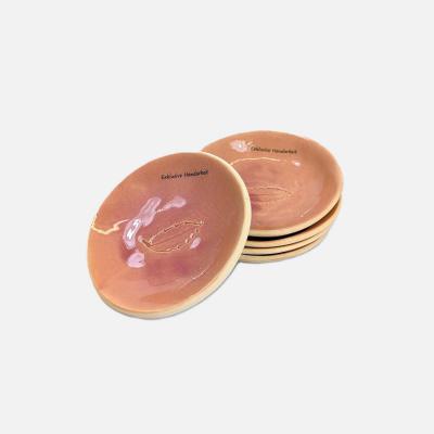 Tonteller, glasiert pfirischfarben